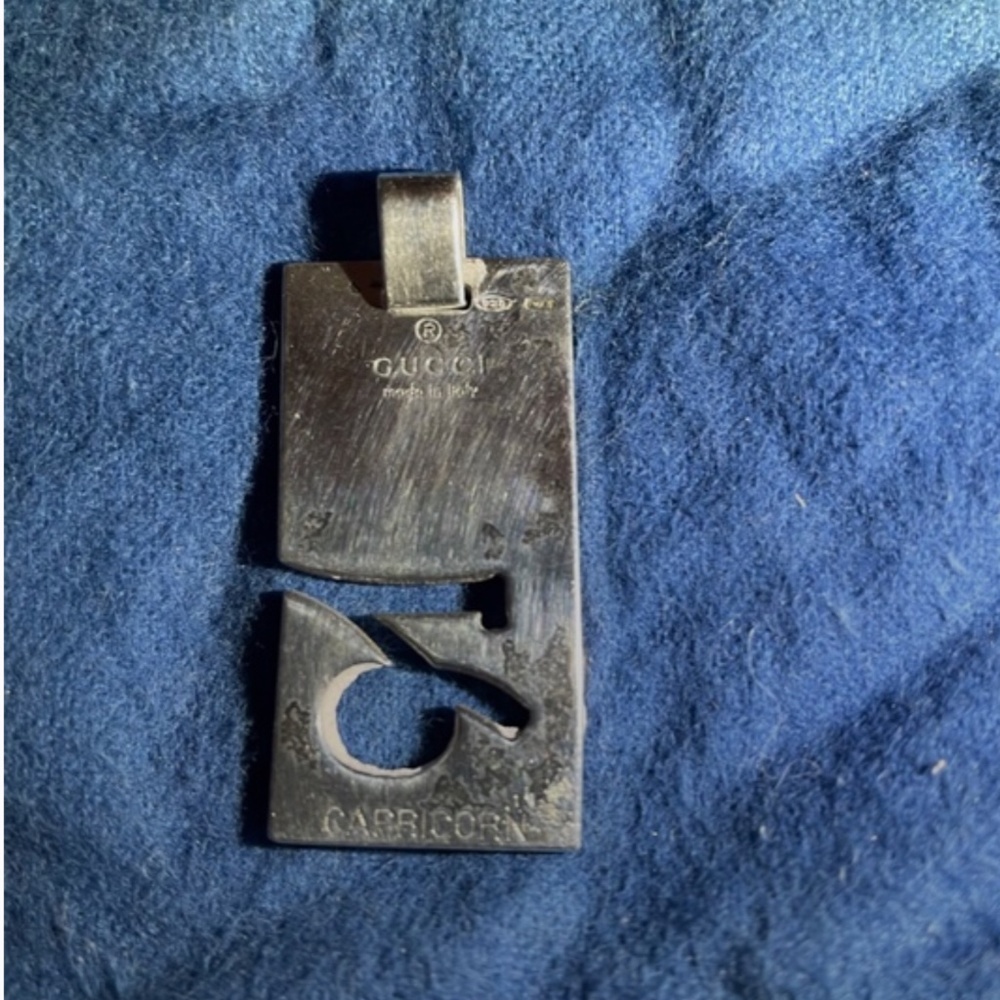Gucci sterling silver large Capricorn symbol pendant!